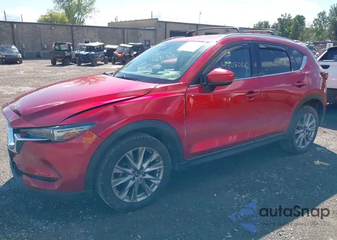 2021 Mazda Cx-5 Grand Touring z USA, uszkodzony, nr VIN JM3KFBDM4M1434364
